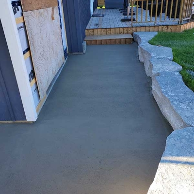 Concrete path around to deck